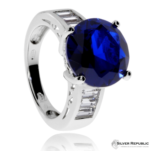 Stříbrný prsten se zirkony (CZ) a syntetickým kamenem modré barvy 