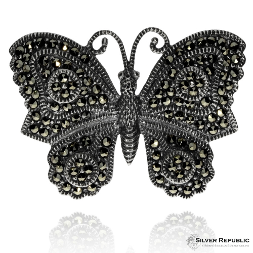 Stříbrná brož ve tvaru  motýla zdobená markazity