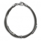 Stříbrný náramek s kuličkou na středu, zdobený krystaly Swarovski 
